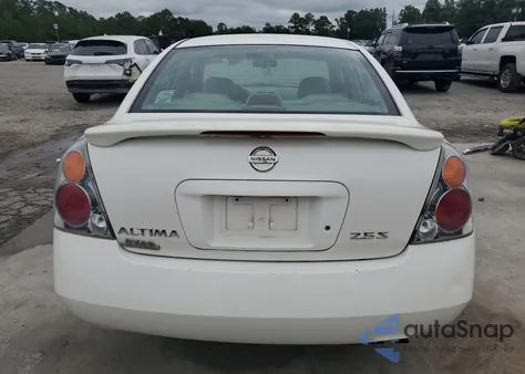 2003 Nissan Altima Base z USA, uszkodzony, nr VIN 1N4AL11D63C242836